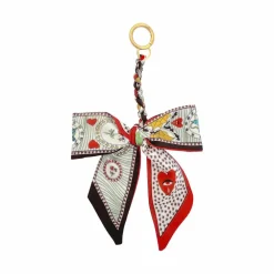 Blue Moon Studio™ Red Hearts & Bees Print Bow Bag Charm