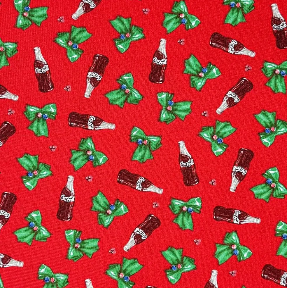 Coca Cola® Red Bottles & Bows Cotton Fabric