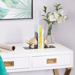CosmoLiving by Cosmopolitan Brass Polystone Coastal Bookends, 6" x 5" x 4"