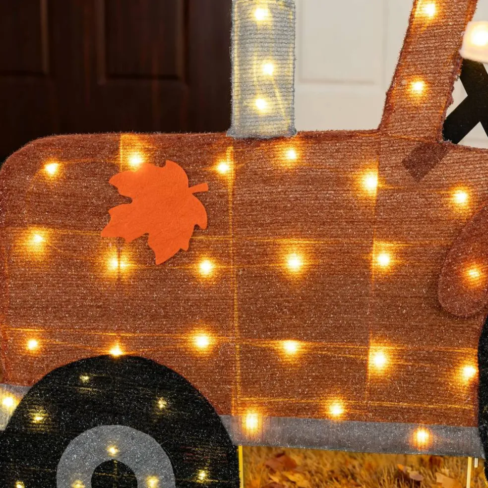 Glitzhome® 44" 2D Lighted Fall Scarecrow on Tractor Outdoor Decor with 100 Warm White LED Lights