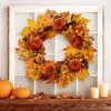 Glitzhome® 24" Fall Velvet Pumpkin, Pinecone & Berry Wreath with Black Metal Wreath Hanger