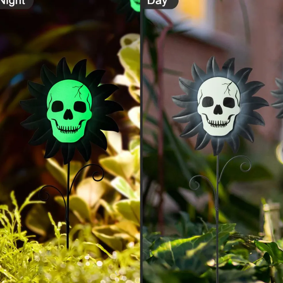 Glitzhome® 24" Halloween Metal Sunflower Skulls Glow-in-Dark Yard Stakes, 3ct.