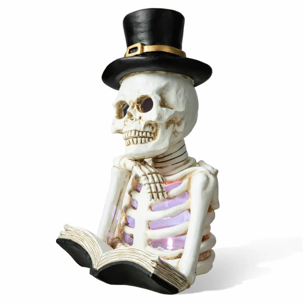 Glitzhome® 10" Lighted Halloween Resin Skull Reading Book Table Décor