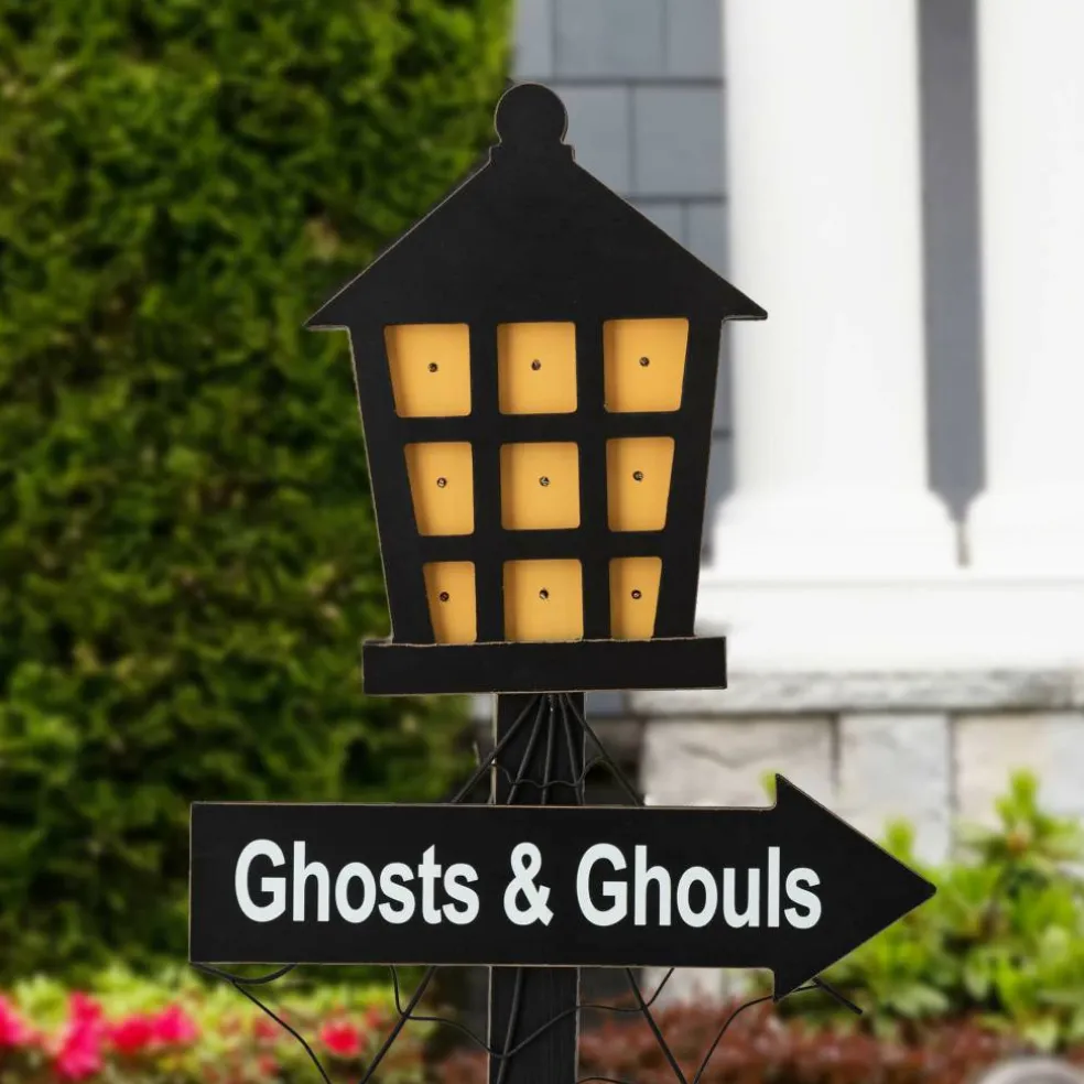 Glitzhome® 42" Lighted Halloween Haunted House Yard Stake with Timer
