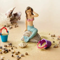 Miniature Mermaid on a Rock by Make Market®