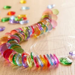 Multicolor Faceted Oval Plastic Beads by Creatology™, 12mm x 15.5mm