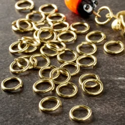 12 Pack: Gold Finish Jump Rings by Bead Landing™
