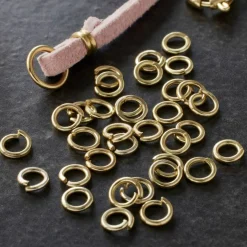 12 Pack: Gold Finish Jump Rings by Bead Landing™