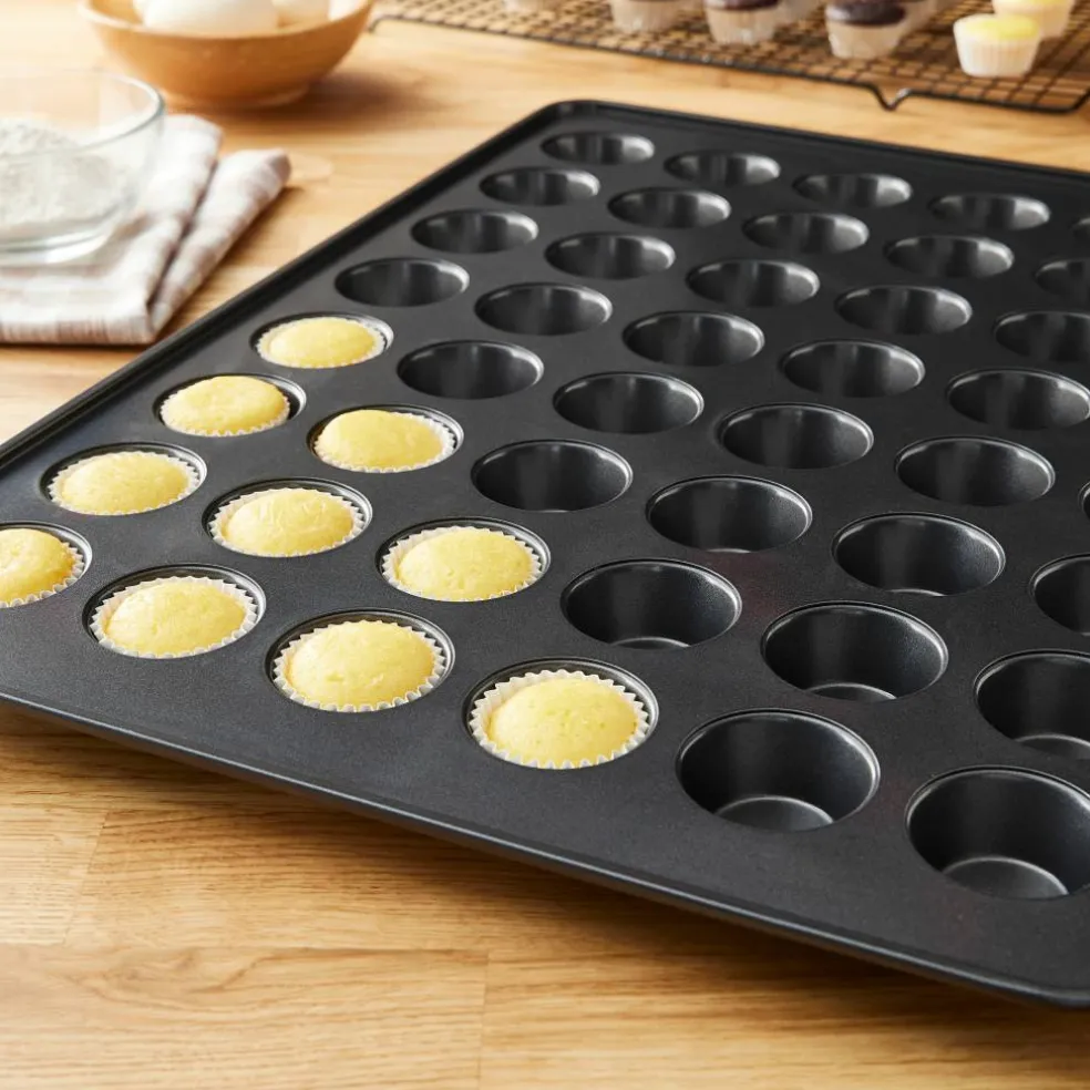 4 Pack: Non-Stick 48-Cavity Mini Muffin Pan by Celebrate It®