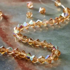 12 Pack: Preciosa® Czech Crystal Bicone Beads, 4mm by Bead Landing™