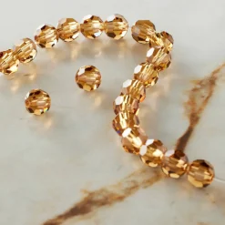 12 Pack: Preciosa Glass Crystal Round Beads, 6mm by Bead Landing™
