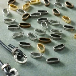 12 Packs: 72 ct. (864 total) Cording D-Rings by Bead Landing™