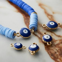 12 Packs: 18 ct. (216 total) Eye Gold Connectors by Bead Landing™