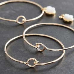 12 Packs: 3 ct. (36 total) Gold Bangles by Bead Landing™