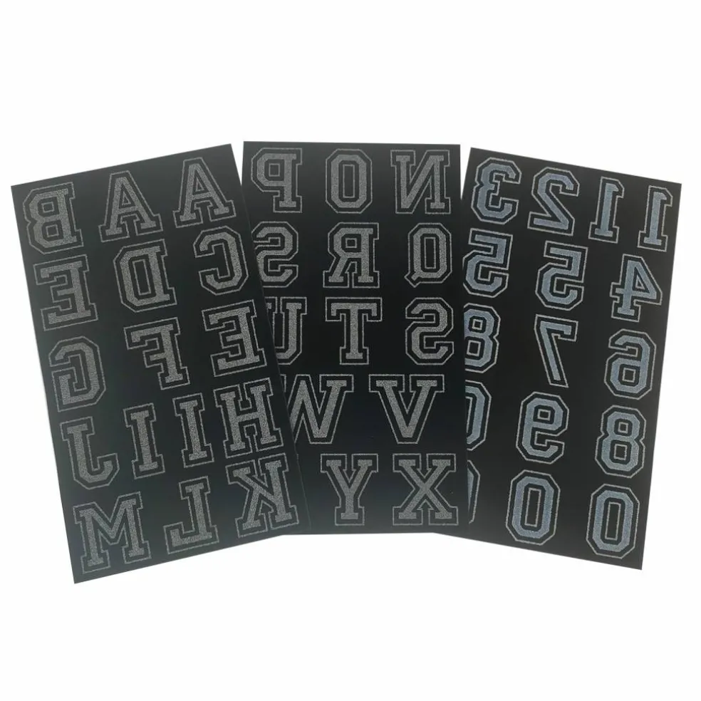 12 Packs: 46 ct. (552 total) 1.75" Iron-On Black Flocked Collegiate Letters by Imagin8™