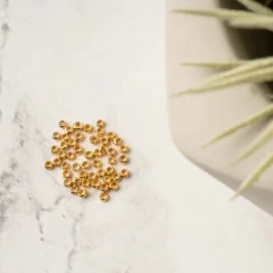 12 Packs: 50 ct. (600 total) 2mm Metal Crimp Beads by Bead Landing™