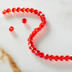 12 Packs: 31 ct. (372 total) Preciosa Glass Crystal Round Beads, 4mm by Bead Landing™