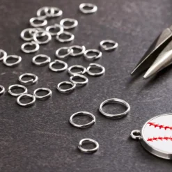 12 Packs: 200 ct. (2,400 total) Rhodium Jump Rings by Creatology™