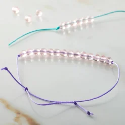 12 Packs: 4 ct. (48 total) The Beadsmith® S-Lon® 0.5mm Mixed Color Bead Cords