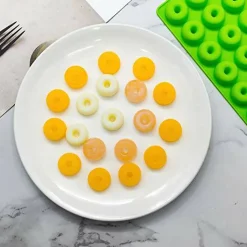 4 Pieces  Gummy Molds with 2 Droppers, Non-stick Silicone Candy Molds Including Mini Dinosaur, Bear Shape, Hearts and Mini Donut, Set of 4