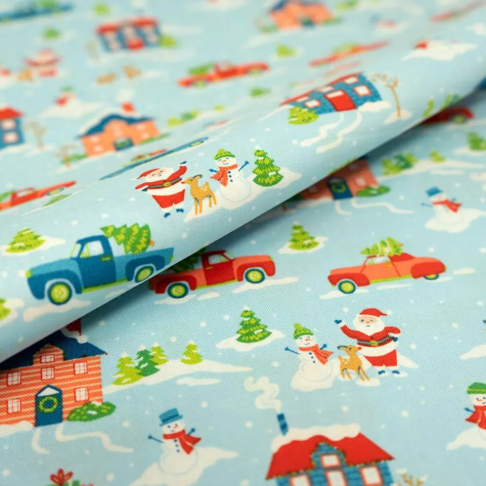 SINGER Blue Santa's Village Cotton Fabric