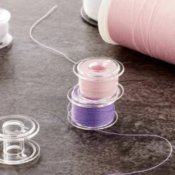 SINGER® Class 15 Transparent Bobbins, 4ct.
