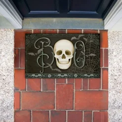 Stupell Industries Boo with Skulls & Bats Printed Outdoor Door Mat, design by Nicole Tamarin, 18"x30"